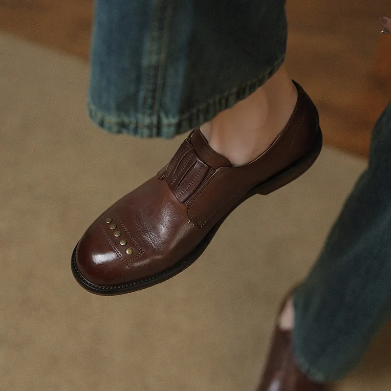Retro Cowhide Round Toe Rivet Decorated Low Heel Loafers in Black/Brown Hubbard's Off Main Oxford Al